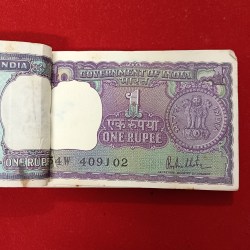 Alternative view of One Rs Rare Big Coin Full Bundle Finance Minister RN Malhotra Year 1980 Reserve Bank of India 409101