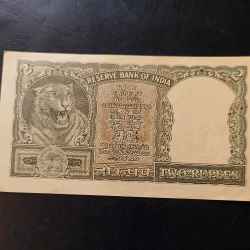 Reserve Bank of India Denominaton 2₹ Backside of half tiger Governor PC Bhattacharya Same and similar note available