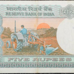 5 Rupees of Republic India (AD 1983) with Farmer ploughing with a tractor while sun is rising - Manmohan Singh Signature